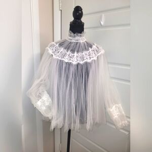 Beautiful white sheer high-neck blouse